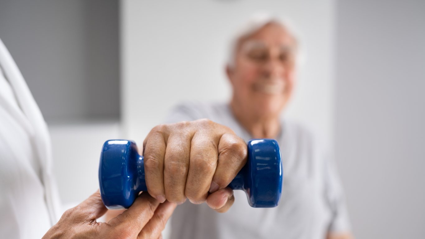 A patient rebuilding strength with guided exercise